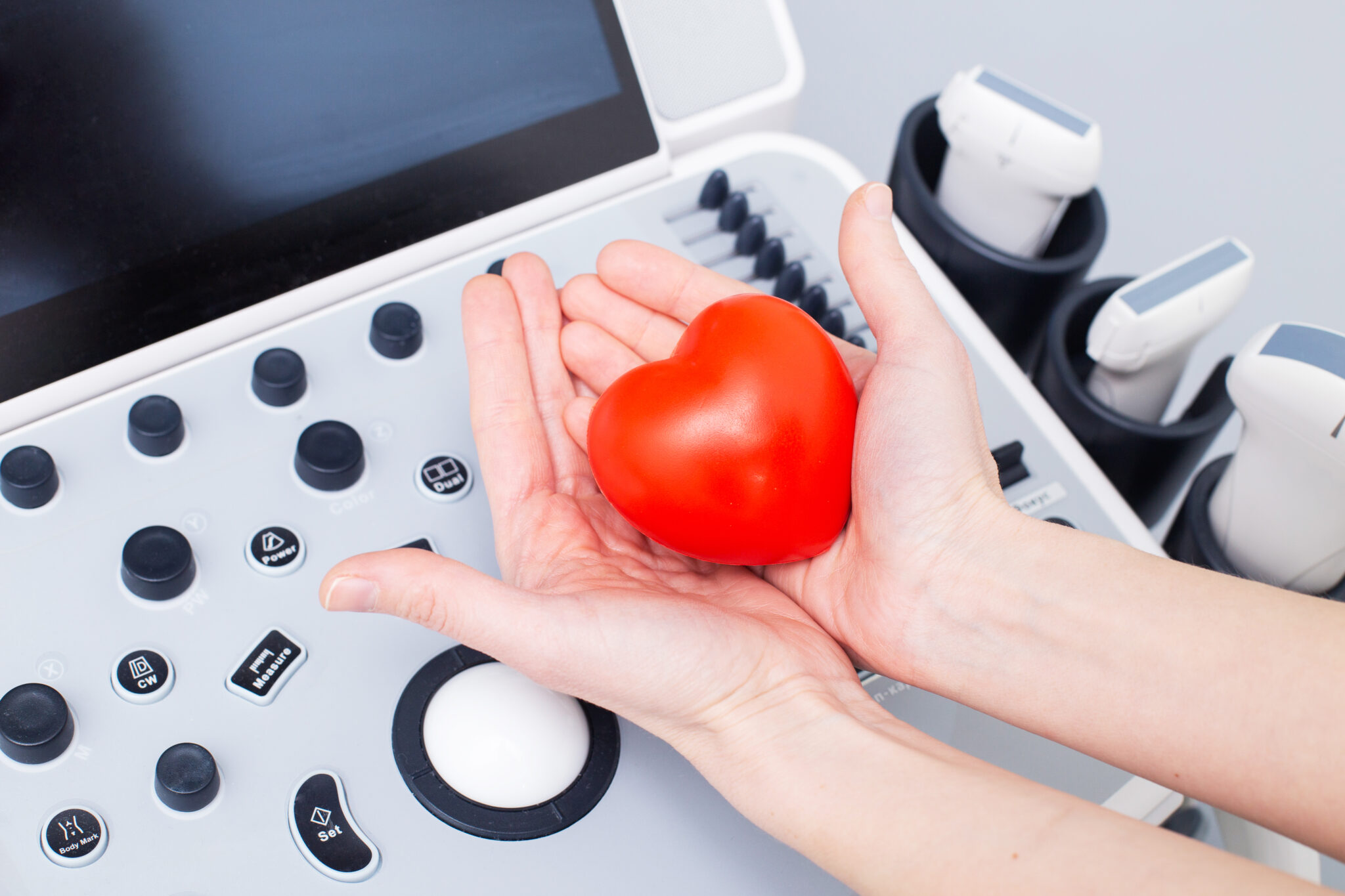 Ultrasound training session in Britain — sonographer with ultrasound machine