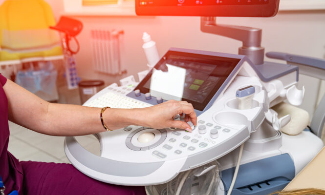 Samsung HD ultrasound machine next to medical cart